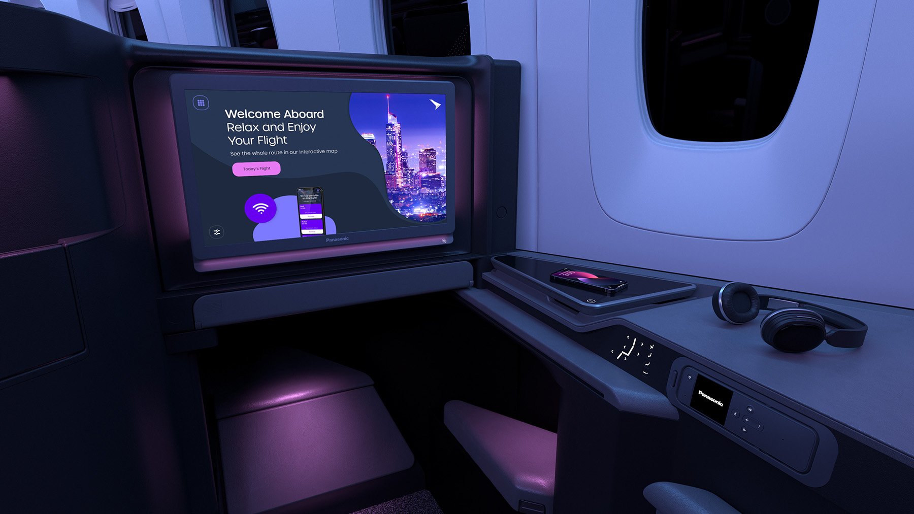 Astrova screen in a business-class seat at night
