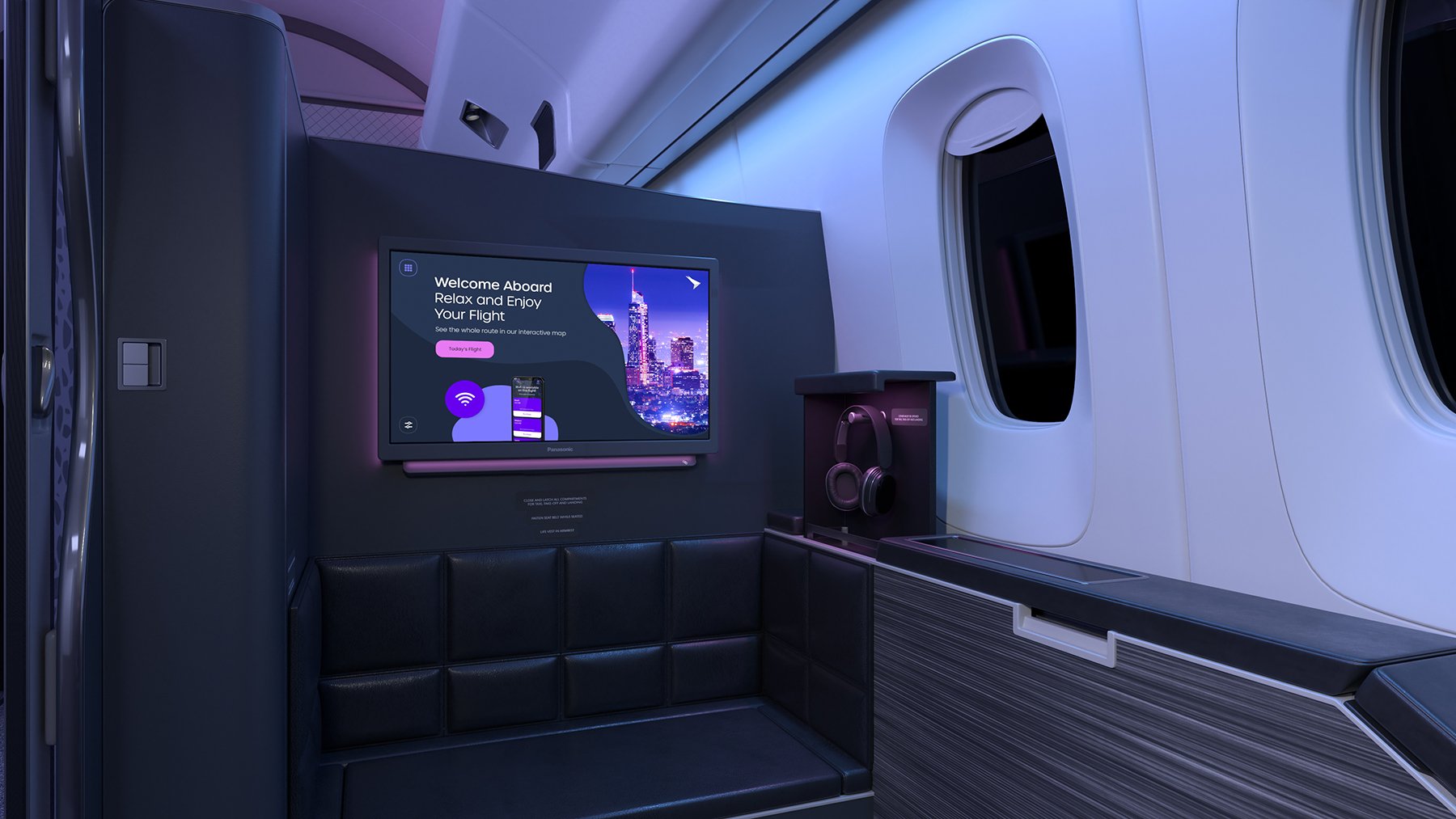 Astrova screen in a first-class seat at night