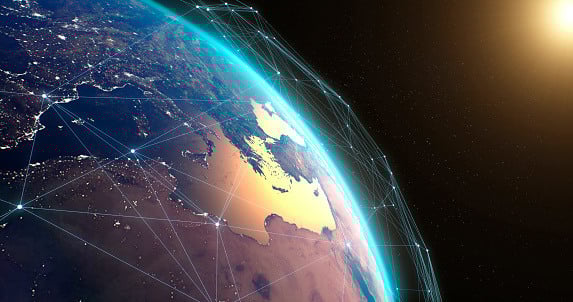 View of Earth from space showing digital network connections over Europe, the Middle East, and Africa