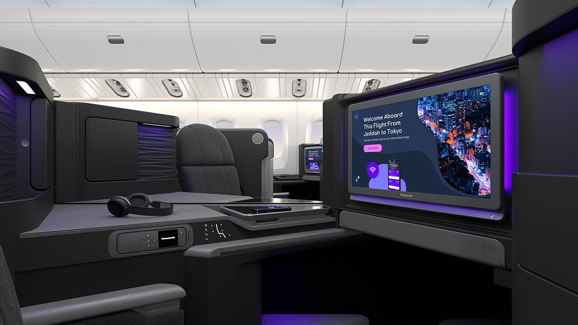 Business class seat with flight info from Jeddah to Tokyo on screen